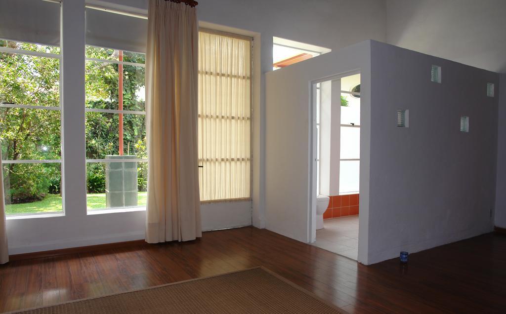 Отель La Casa De Las Magnolias Coyoacan Номер фото